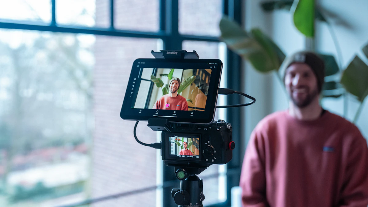 Camera on a tripod set up to record a business marketing video indoors